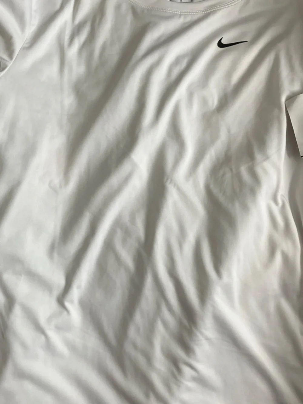 Nike White Performance Bedding Top with Black Swoosh